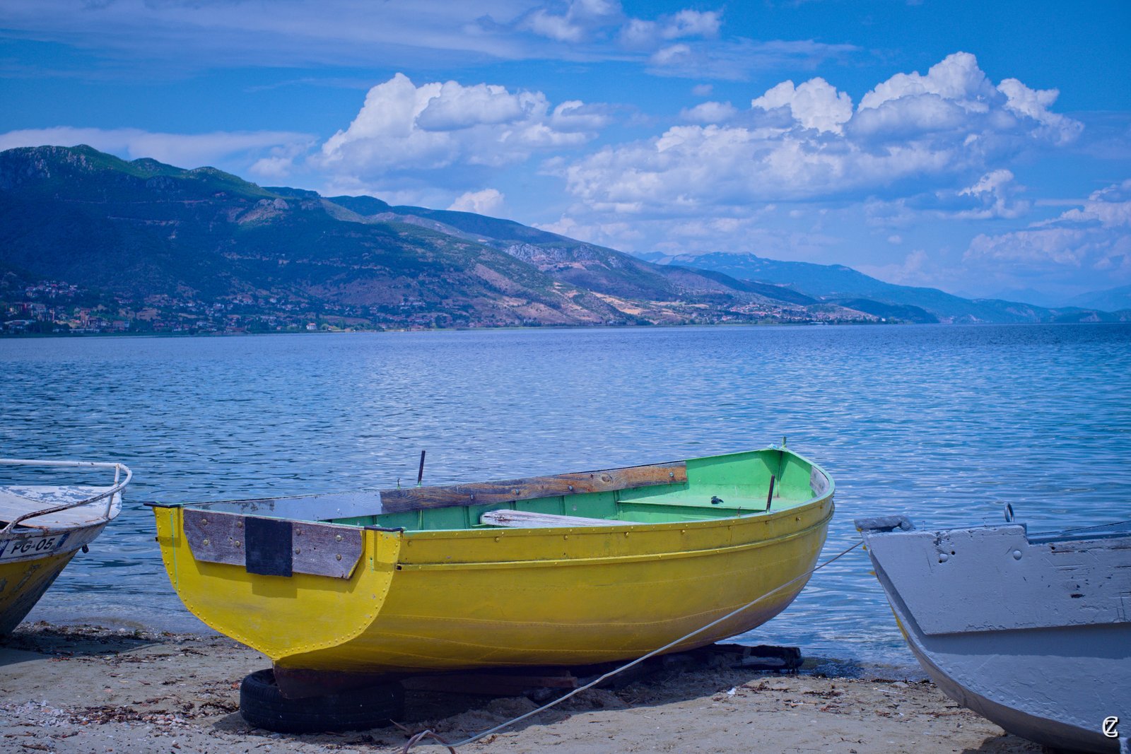 A boat on Lake Ohrid at Pogradec — the lake's bounty underpins the town's famous fish restaurant culture